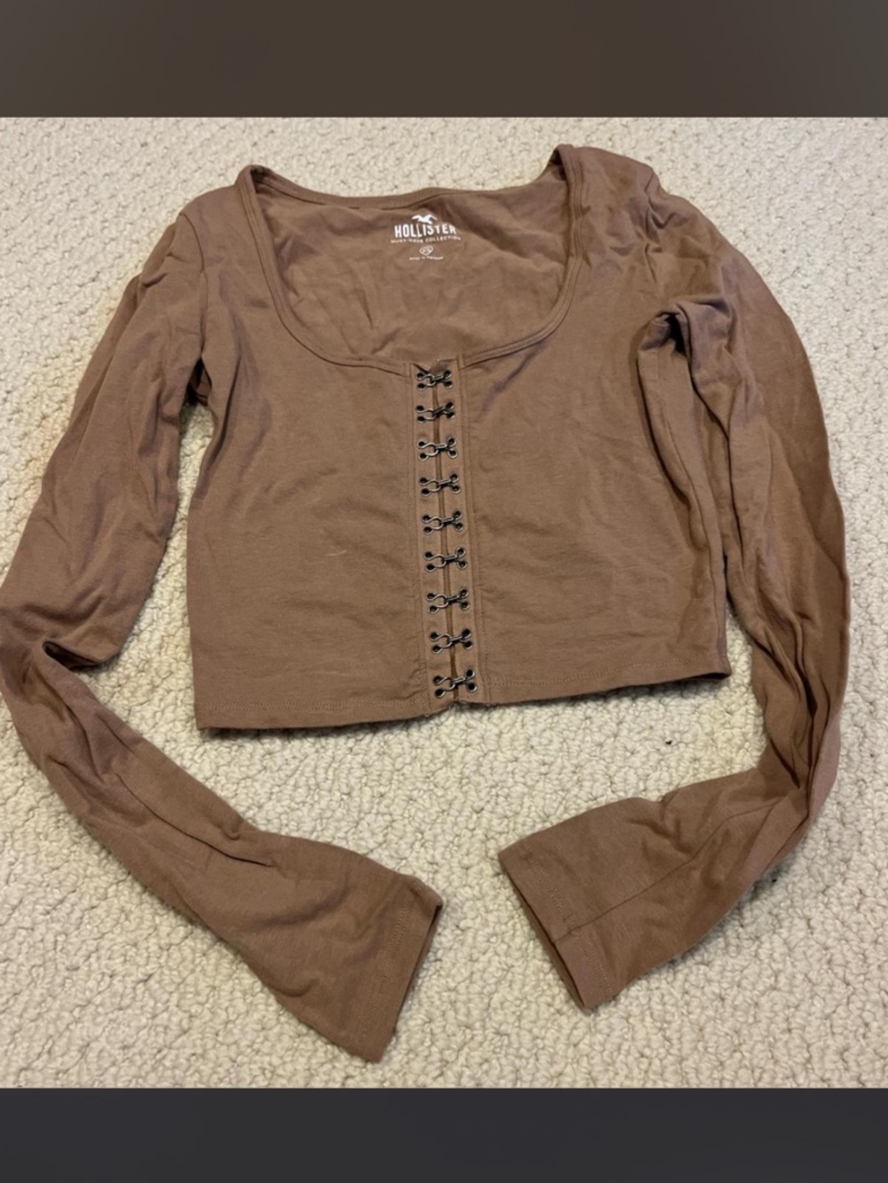 brown tan long sleeve with lace up metal details